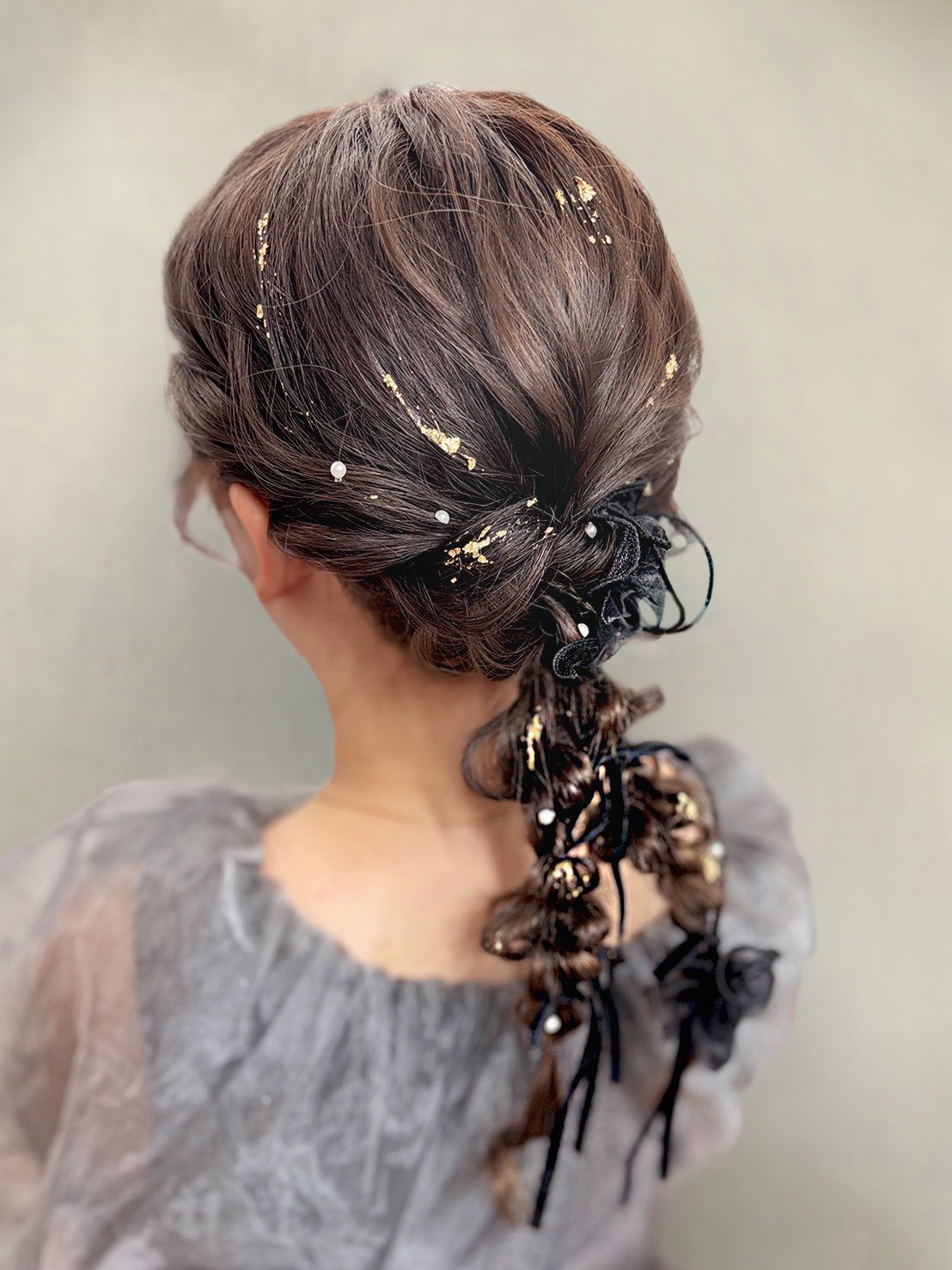 編み込みのアップスタイル